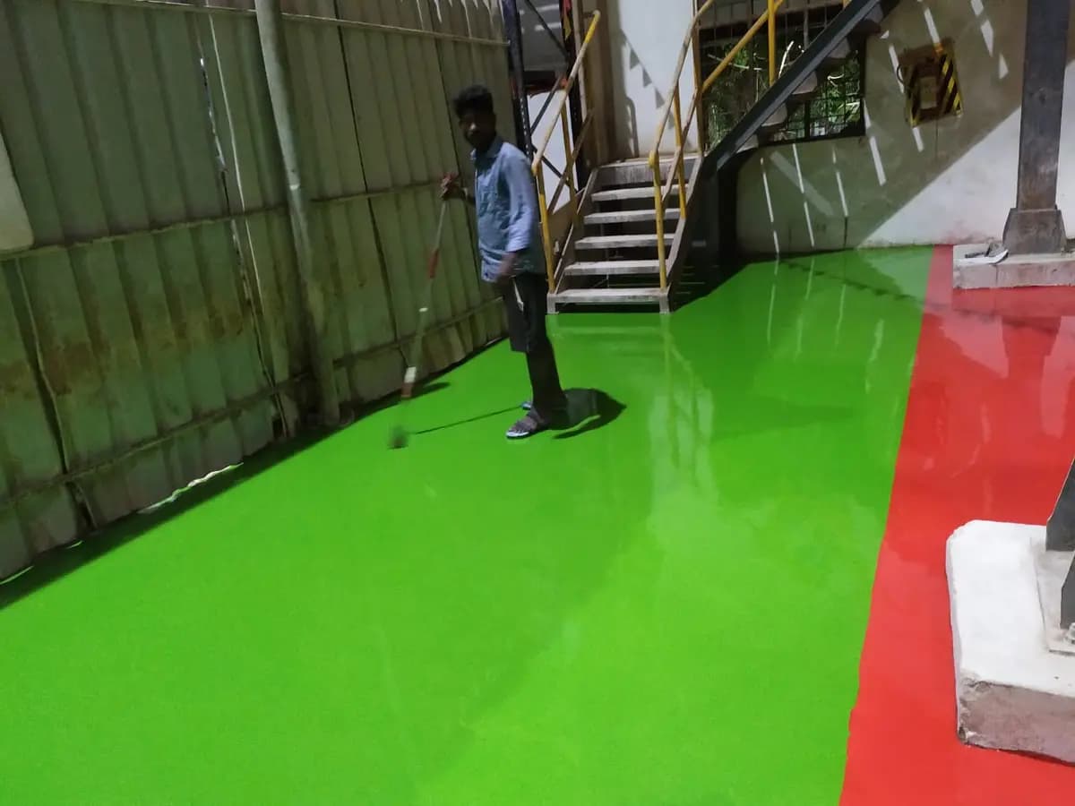 Heavy-duty epoxy flooring installation in industrial factory – Chem Coats