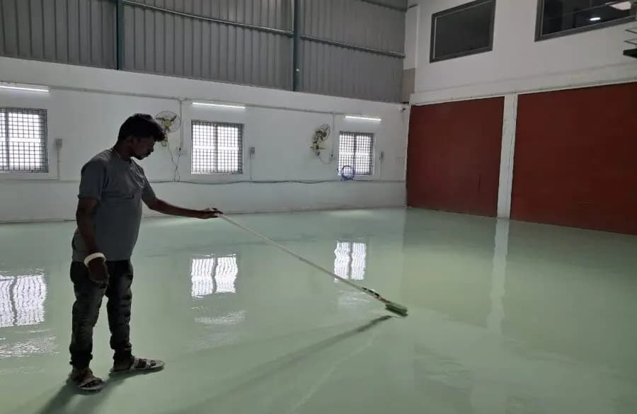 Industrial epoxy flooring installation for Aadhi Tape Solutions – Chem Coats