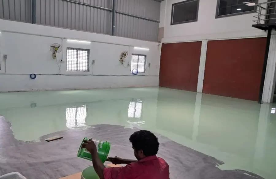 Industrial epoxy flooring installation for Aadhi Tape Solutions – Chem Coats